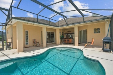 Discover your ideal Lakefront Pool Home at the end of a quiet on Oaks National Golf Course in Florida - for sale on GolfHomes.com, golf home, golf lot