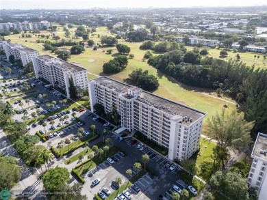 Enjoy golf views from a private screened patio in this updated on Palm-Aire Country Club and Resort - The Oaks in Florida - for sale on GolfHomes.com, golf home, golf lot
