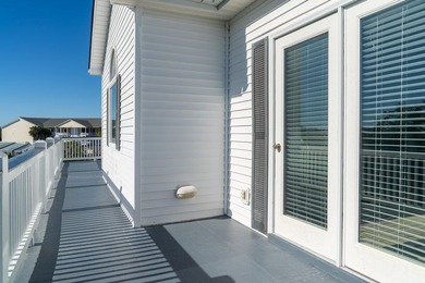 Spacious 2-story home offering panoramic views of the salt marsh on The Plantation Course At Edisto in South Carolina - for sale on GolfHomes.com, golf home, golf lot