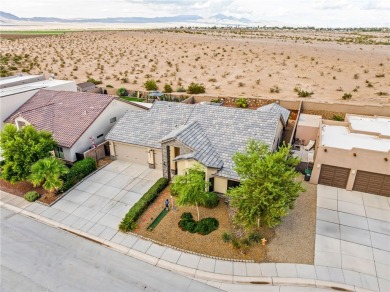 Step into this beautifully maintained custom 2021 home in the on Desert Lakes Golf Course in Arizona - for sale on GolfHomes.com, golf home, golf lot