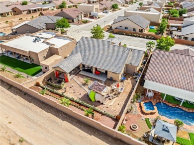 Step into this beautifully maintained custom 2021 home in the on Desert Lakes Golf Course in Arizona - for sale on GolfHomes.com, golf home, golf lot