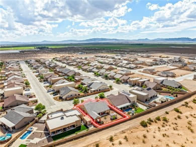 Step into this beautifully maintained custom 2021 home in the on Desert Lakes Golf Course in Arizona - for sale on GolfHomes.com, golf home, golf lot
