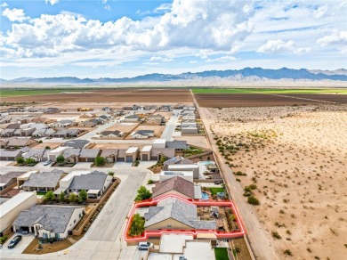 Step into this beautifully maintained custom 2021 home in the on Desert Lakes Golf Course in Arizona - for sale on GolfHomes.com, golf home, golf lot
