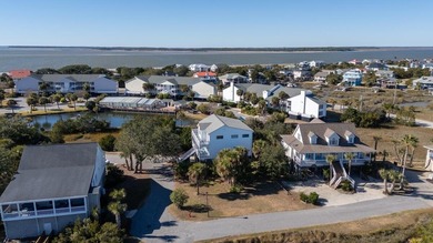 Spacious 2-story home offering panoramic views of the salt marsh on The Plantation Course At Edisto in South Carolina - for sale on GolfHomes.com, golf home, golf lot