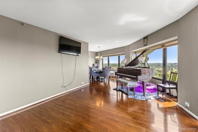 Welcome to this remarkable 2-bedroom, 2-bath residence located on Evergreen Hills Golf Course in Michigan - for sale on GolfHomes.com, golf home, golf lot