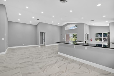 Beautifully renovated 3BR/2BA home in the amazing non-gated on Westchester Golf and Country Club in Florida - for sale on GolfHomes.com, golf home, golf lot