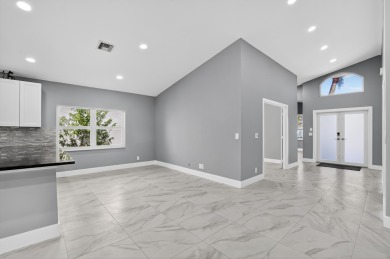 Beautifully renovated 3BR/2BA home in the amazing non-gated on Westchester Golf and Country Club in Florida - for sale on GolfHomes.com, golf home, golf lot