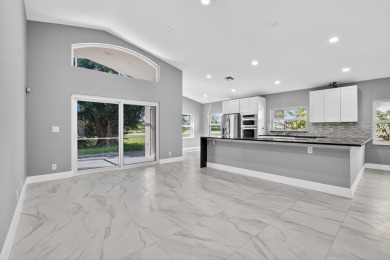 Beautifully renovated 3BR/2BA home in the amazing non-gated on Westchester Golf and Country Club in Florida - for sale on GolfHomes.com, golf home, golf lot