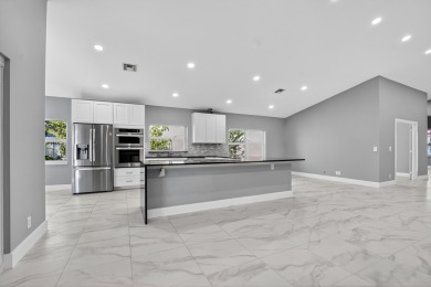 Beautifully renovated 3BR/2BA home in the amazing non-gated on Westchester Golf and Country Club in Florida - for sale on GolfHomes.com, golf home, golf lot