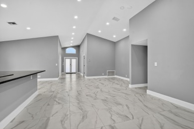 Beautifully renovated 3BR/2BA home in the amazing non-gated on Westchester Golf and Country Club in Florida - for sale on GolfHomes.com, golf home, golf lot