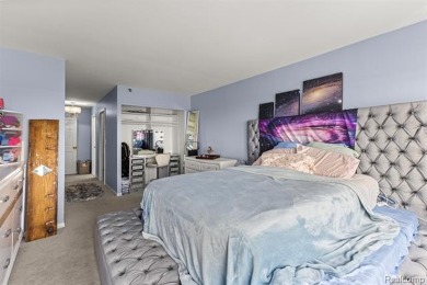 Welcome to this remarkable 2-bedroom, 2-bath residence located on Evergreen Hills Golf Course in Michigan - for sale on GolfHomes.com, golf home, golf lot