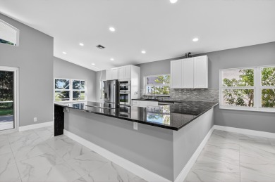 Beautifully renovated 3BR/2BA home in the amazing non-gated on Westchester Golf and Country Club in Florida - for sale on GolfHomes.com, golf home, golf lot