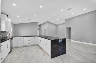 Beautifully renovated 3BR/2BA home in the amazing non-gated on Westchester Golf and Country Club in Florida - for sale on GolfHomes.com, golf home, golf lot