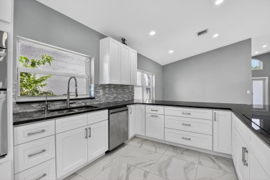 Beautifully renovated 3BR/2BA home in the amazing non-gated on Westchester Golf and Country Club in Florida - for sale on GolfHomes.com, golf home, golf lot