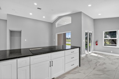 Beautifully renovated 3BR/2BA home in the amazing non-gated on Westchester Golf and Country Club in Florida - for sale on GolfHomes.com, golf home, golf lot