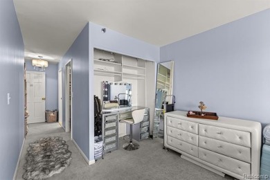 Welcome to this remarkable 2-bedroom, 2-bath residence located on Evergreen Hills Golf Course in Michigan - for sale on GolfHomes.com, golf home, golf lot