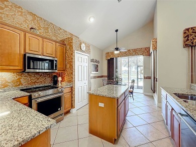Stunning 2-Story Home in the Gated Golf Community of Sarasota on Sarasota National Golf Club in Florida - for sale on GolfHomes.com, golf home, golf lot