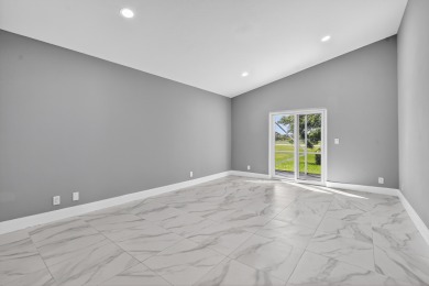 Beautifully renovated 3BR/2BA home in the amazing non-gated on Westchester Golf and Country Club in Florida - for sale on GolfHomes.com, golf home, golf lot