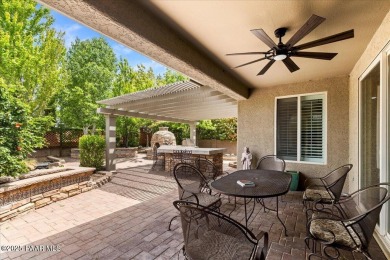 Tucked into the rolling hills of the prestigious Stoneridge golf on StoneRidge Golf Course in Arizona - for sale on GolfHomes.com, golf home, golf lot