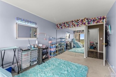 Welcome to this remarkable 2-bedroom, 2-bath residence located on Evergreen Hills Golf Course in Michigan - for sale on GolfHomes.com, golf home, golf lot