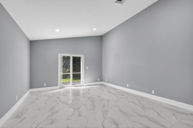 Beautifully renovated 3BR/2BA home in the amazing non-gated on Westchester Golf and Country Club in Florida - for sale on GolfHomes.com, golf home, golf lot