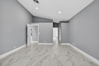 Beautifully renovated 3BR/2BA home in the amazing non-gated on Westchester Golf and Country Club in Florida - for sale on GolfHomes.com, golf home, golf lot