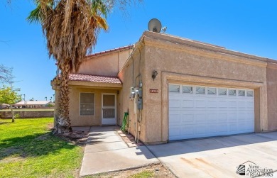 Highly sought after 3 bedroom, 2 1/4 bath townhome located on Mesa Del Sol Golf Club in Arizona - for sale on GolfHomes.com, golf home, golf lot