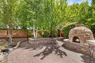 Tucked into the rolling hills of the prestigious Stoneridge golf on StoneRidge Golf Course in Arizona - for sale on GolfHomes.com, golf home, golf lot