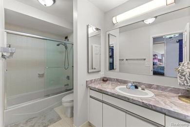 Welcome to this remarkable 2-bedroom, 2-bath residence located on Evergreen Hills Golf Course in Michigan - for sale on GolfHomes.com, golf home, golf lot