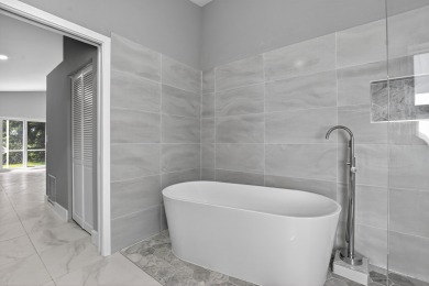 Beautifully renovated 3BR/2BA home in the amazing non-gated on Westchester Golf and Country Club in Florida - for sale on GolfHomes.com, golf home, golf lot