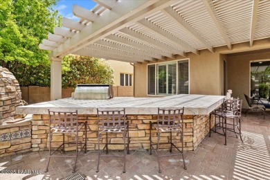 Tucked into the rolling hills of the prestigious Stoneridge golf on StoneRidge Golf Course in Arizona - for sale on GolfHomes.com, golf home, golf lot