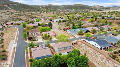 Tucked into the rolling hills of the prestigious Stoneridge golf on StoneRidge Golf Course in Arizona - for sale on GolfHomes.com, golf home, golf lot