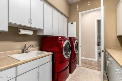 SPECTACULAR AMENITIES AND RESORT STYLE LIVING!!!This desirable on Poston Butte Golf Club in Arizona - for sale on GolfHomes.com, golf home, golf lot