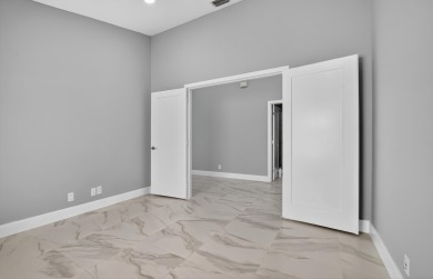 Beautifully renovated 3BR/2BA home in the amazing non-gated on Westchester Golf and Country Club in Florida - for sale on GolfHomes.com, golf home, golf lot