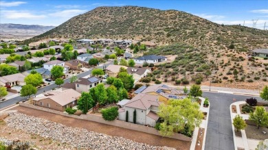 Tucked into the rolling hills of the prestigious Stoneridge golf on StoneRidge Golf Course in Arizona - for sale on GolfHomes.com, golf home, golf lot