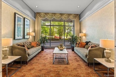 Welcome to this remarkable 2-bedroom, 2-bath residence located on Evergreen Hills Golf Course in Michigan - for sale on GolfHomes.com, golf home, golf lot