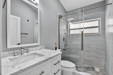 Beautifully renovated 3BR/2BA home in the amazing non-gated on Westchester Golf and Country Club in Florida - for sale on GolfHomes.com, golf home, golf lot