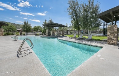 Tucked into the rolling hills of the prestigious Stoneridge golf on StoneRidge Golf Course in Arizona - for sale on GolfHomes.com, golf home, golf lot