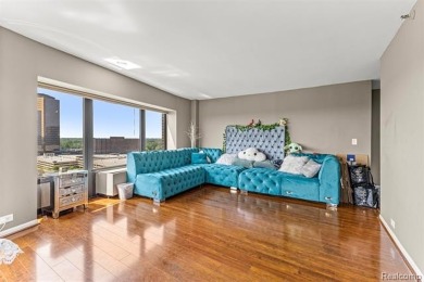 Welcome to this remarkable 2-bedroom, 2-bath residence located on Evergreen Hills Golf Course in Michigan - for sale on GolfHomes.com, golf home, golf lot