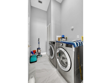 Beautifully renovated 3BR/2BA home in the amazing non-gated on Westchester Golf and Country Club in Florida - for sale on GolfHomes.com, golf home, golf lot