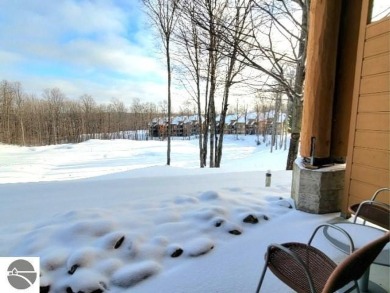 This furnished ground level suite is an ideal spot to enjoy all on Cedar River Golf Course in Michigan - for sale on GolfHomes.com, golf home, golf lot