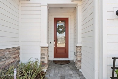 Resort style living defines this premier gated 55+ golf on Cimarrone Golf and Country Club in Florida - for sale on GolfHomes.com, golf home, golf lot