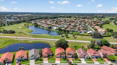 Beautifully renovated 3BR/2BA home in the amazing non-gated on Westchester Golf and Country Club in Florida - for sale on GolfHomes.com, golf home, golf lot