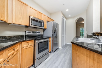 Resort style living in the golf community Palencia. 2bed/2 bath on The Palencia Club in Florida - for sale on GolfHomes.com, golf home, golf lot