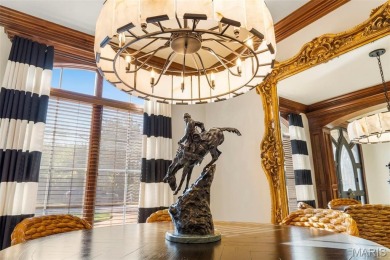 Absolutely stunning home perched above the signature 17th hole on Buffalo Ridge Springs Golf Club in Missouri - for sale on GolfHomes.com, golf home, golf lot