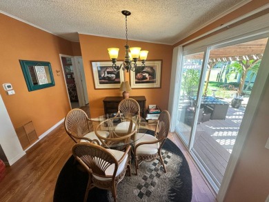 This 2 bedrooms, 2 bathrooms stucco home is being sold furnished on Del Tura Golf and Country Club in Florida - for sale on GolfHomes.com, golf home, golf lot