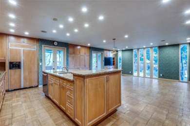 This stunning contemporary home on the 12th Fairway of the Las on Las Colinas Country Club in Texas - for sale on GolfHomes.com, golf home, golf lot