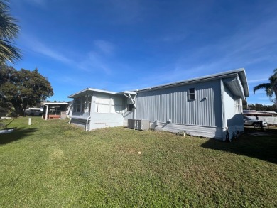 Fabulous 2-bedroom 2 bath home in an active community in on Bay Tree Golf Course in Florida - for sale on GolfHomes.com, golf home, golf lot