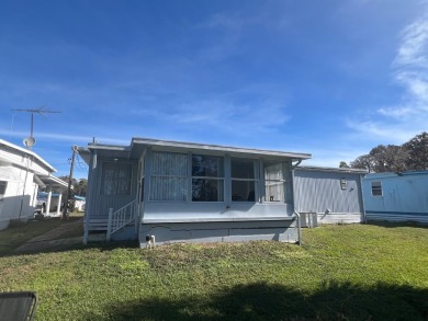 Fabulous 2-bedroom 2 bath home in an active community in on Bay Tree Golf Course in Florida - for sale on GolfHomes.com, golf home, golf lot