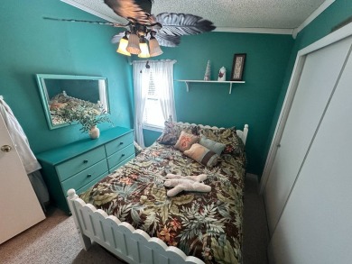 This 2 bedrooms, 2 bathrooms stucco home is being sold furnished on Del Tura Golf and Country Club in Florida - for sale on GolfHomes.com, golf home, golf lot